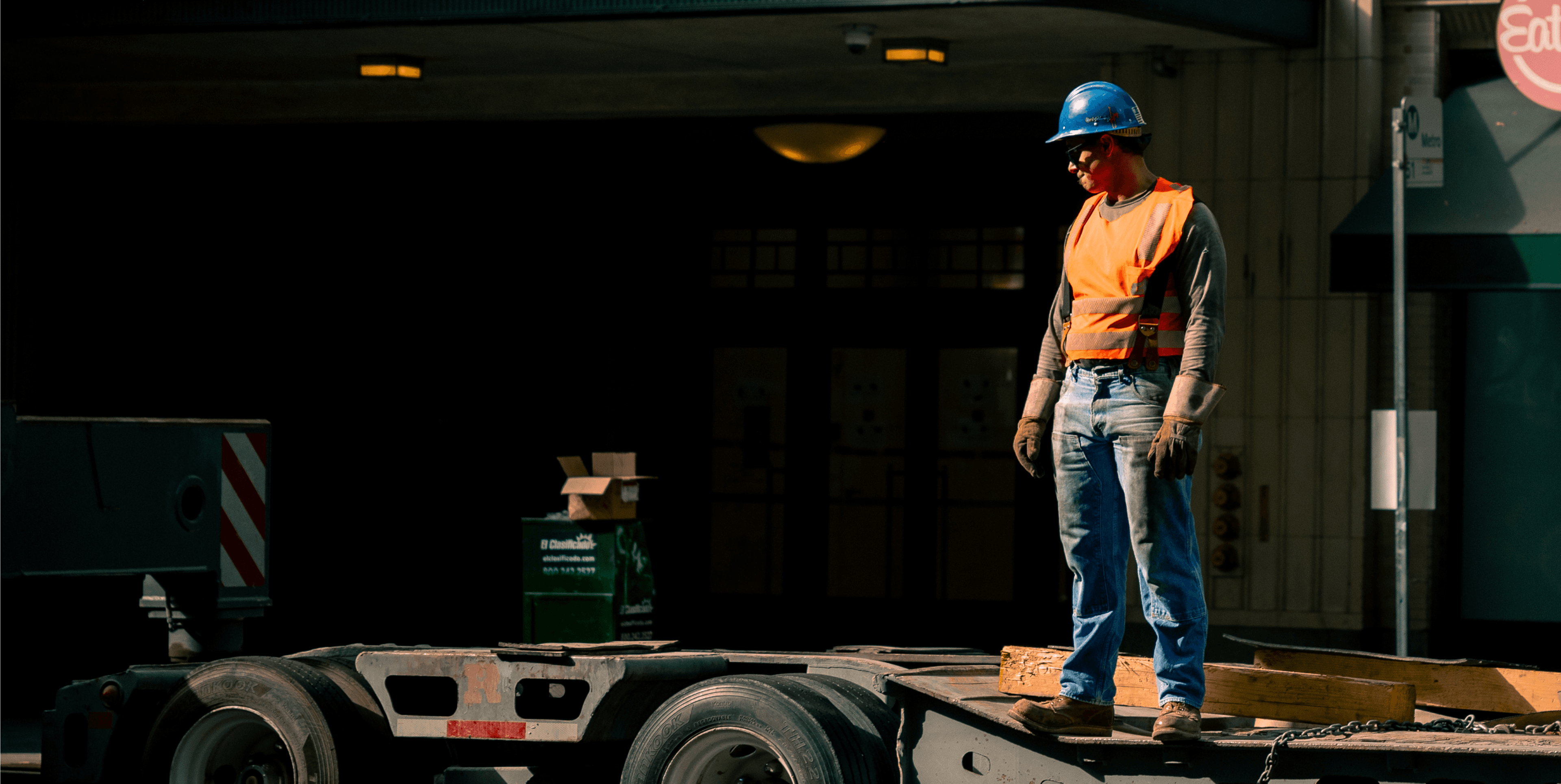 Worker on a construction site reviewing project data