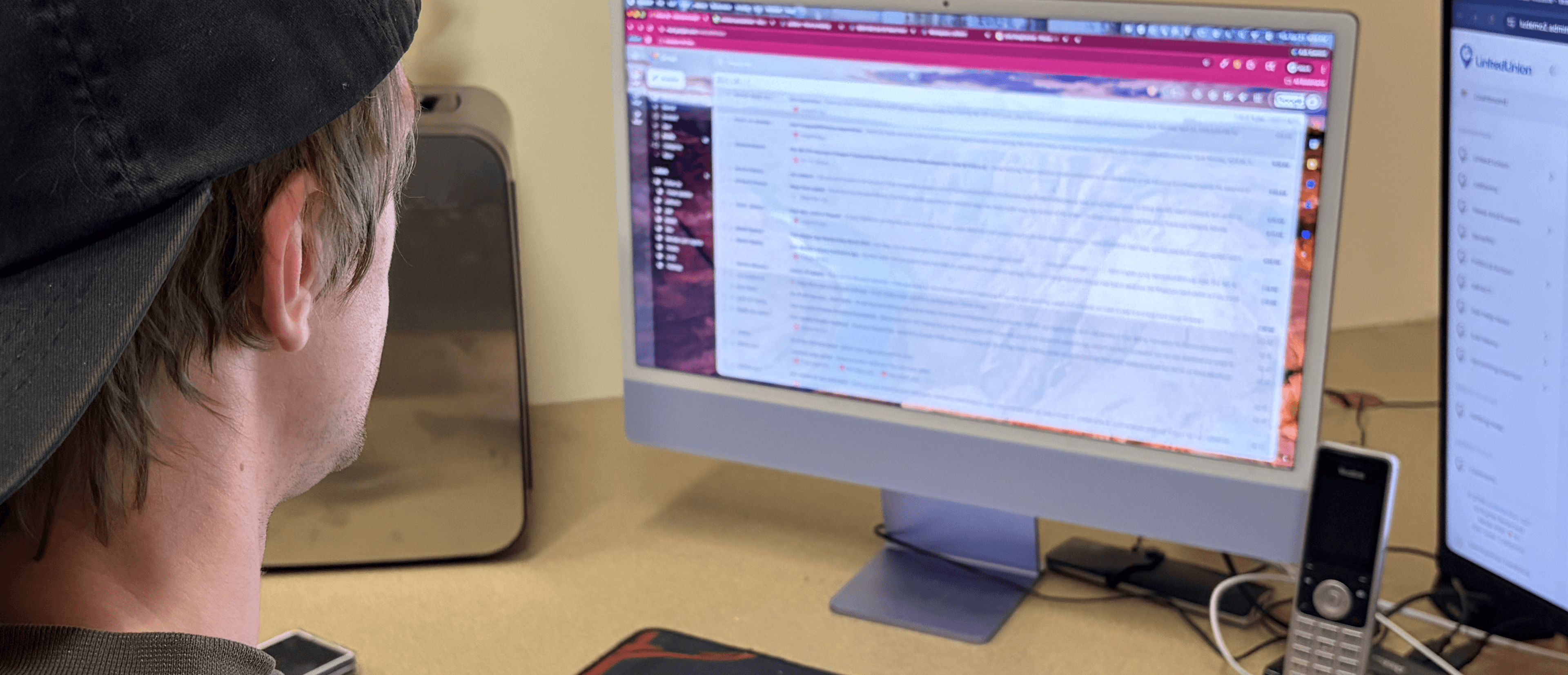 LinkedUnion team member providing support at a workstation