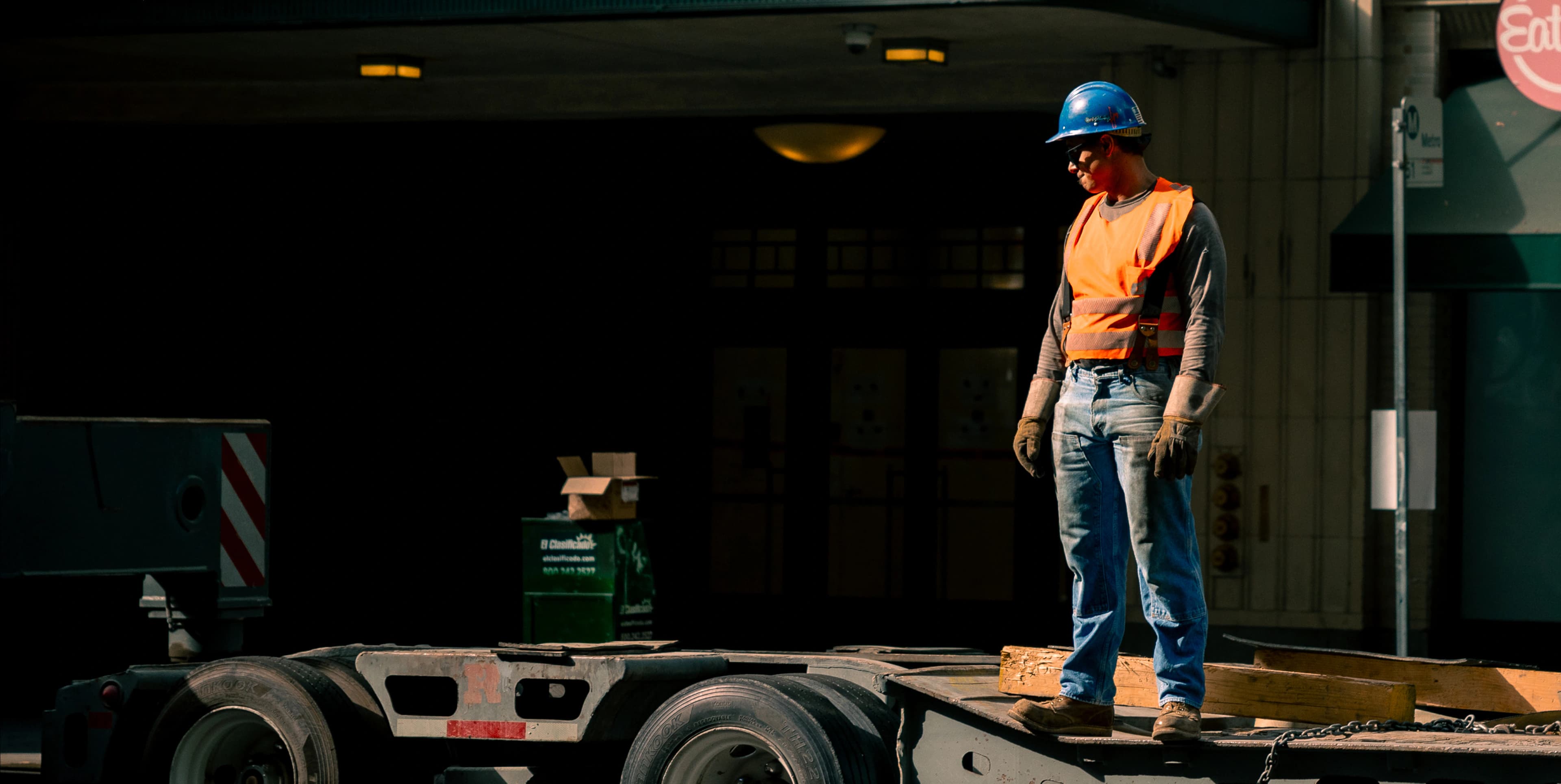 Worker on a construction site reviewing project data
